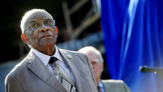Legendary TSU track coach Ed Temple looks about during an event with a statue of him being unveiling at First Tennessee Park Aug. 28, 2015.