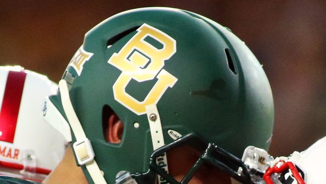 A Baylor Bears helmet is shown in a 2015 game.