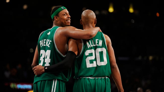 Boston's Paul Pierce and Ray Allen celebrate their 97-91 victory over the Lakers during Game 4 of the NBA Finals.
