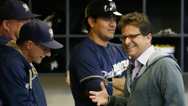 Brewers owner Mark Attanasio said his expectations for this season's club have risen, but the team isn't going to scrap its long-term plan of building the team into a perennial winner.