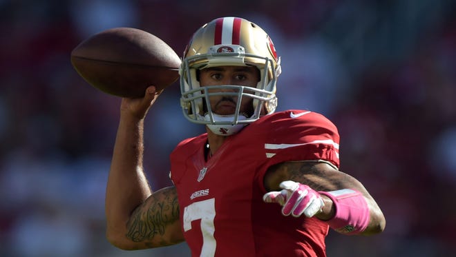 Colin Kaepernick says he'll "continue to sit" during the national anthem until he sees "significant change."