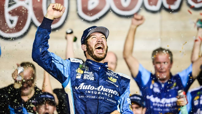 Martin Truex Jr. celebrates his victory at the 2017 Go Bowling 400 at Kansas Speedway, his second victory of the season.