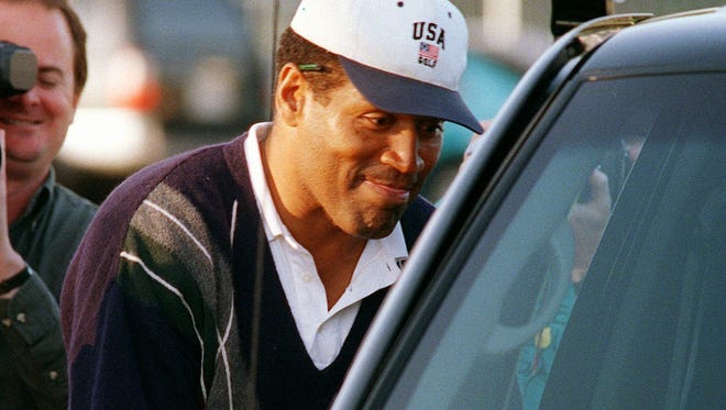 Simpson departs the Rancho Park Golf Course in 1997,the day after the jury in his wrongful death civil trial awarded the plaintiffs $25 million in punitive damages.