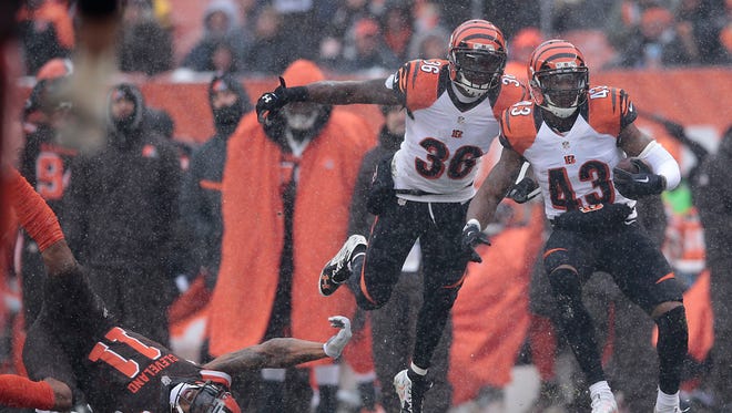 Cincinnati Bengals free safety George Iloka (43) comes down with an interception in the second quarter during the Week 14 NFL game between the Cincinnati Bengals and the Cleveland Browns, Sunday, Dec. 11, 2016, at FirstEnergy Stadium in Cleveland. Cincinnati won 23-10.