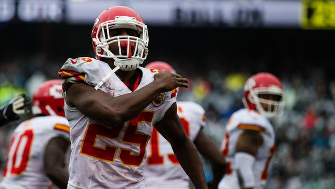 Chiefs running back Jamaal Charles (25) celebrates scoring a touchdown against the Raiders.