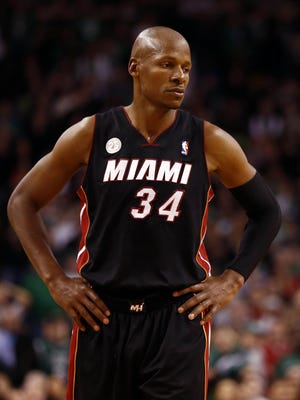 Miami Heat shooting guard Ray Allen (34) reacts during the second half of a game against the Boston Celtics at TD Garden.