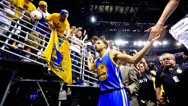 2015: Stephen Curry walks off the court after a win against the New Orleans Pelicans.