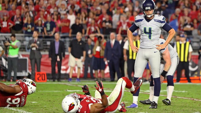 Seahawks kicker Stephen Hauschka (4) reacts after missing a field goal in overtime against the Cardinals.