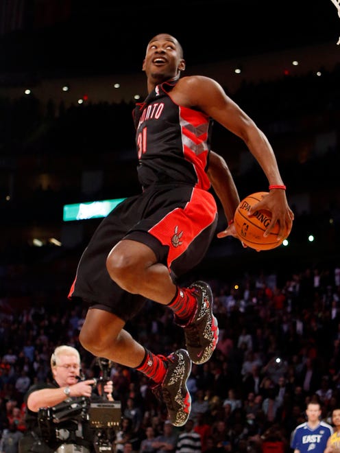 2013: Terrence Ross attempts a behind-the-back dunk during the 2013 contest. Ross would win the contest.