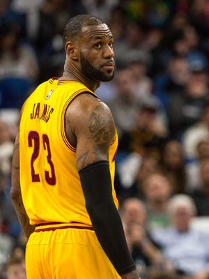 LeBron James looks on during the second quarter against the Minnesota Timberwolves.