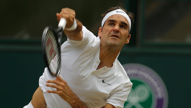 Roger Federer serves to Marin Cilic.