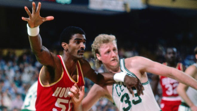 Ralph Sampson #50 of the Houston Rockets posts up against Larry Bird #33 of the Boston Celtics during the 1986 NBA Finals at the Boston Garden in Boston, Massachusetts.