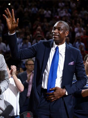 Former Houston Rockets player Dikembe Mutombo is honored before the second quarter of a game.