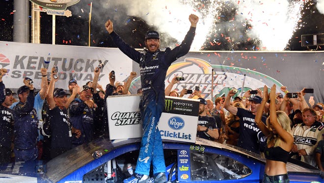 Martin Truex Jr. celebrates at Kentucky Speedway after winning the July 14, race, his fourth of the 2018 season.