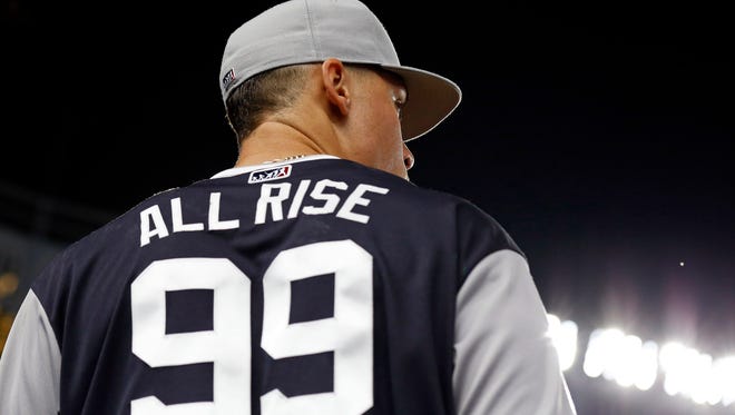 Aug. 25: Aaron Judge heads to the dugout wearing his All Rise uniform for MLB Players Weekend..