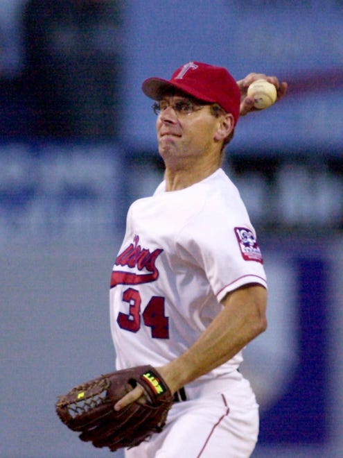 Rep. Steve Largent, R-Okla, pitches for the Republicans in the 40th annual congressional baseball game on June 21, 2001, at Prince Georges County Stadium in Bowie Md.