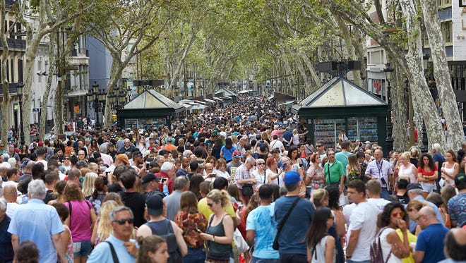 Residents and tourists crowd as they visit the Las Ramblas in Barcelona three days after the terrorist attacks in Barcelona and Cambrils on Aug. 20, 2017 in Barcelona, Spain.