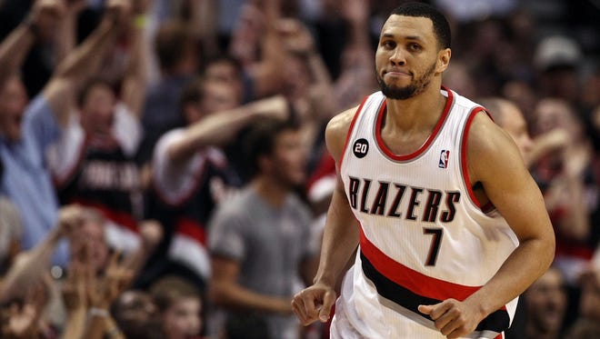 Portland Trail Blazers guard Brandon Roy reacts after making a shot against the Dallas Mavericks during the 2011 NBA playoffs.