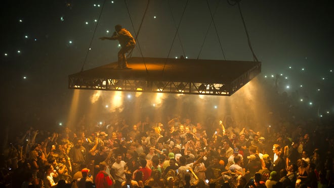 Kanye West performs at the Bridgestone Arena in Nashville, Tenn.
