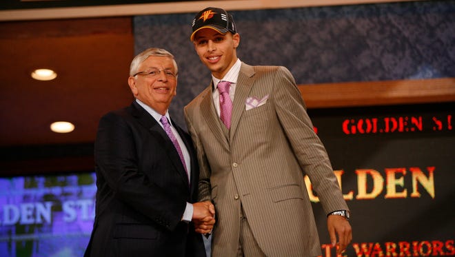 2009: Stephen Curry is drafted by Golden State with the seventh pick during the 63rd annual NBA Draft.