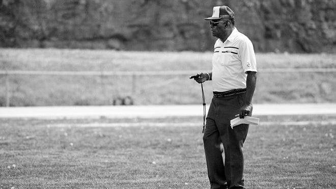 Tennessee State University famed coach Ed Temple Ðstopwatch ever in hand, eyes ever on the track Ð is watching one of his runners during a race in the 9th annual Tigerbelle Relays April 12, 1986.