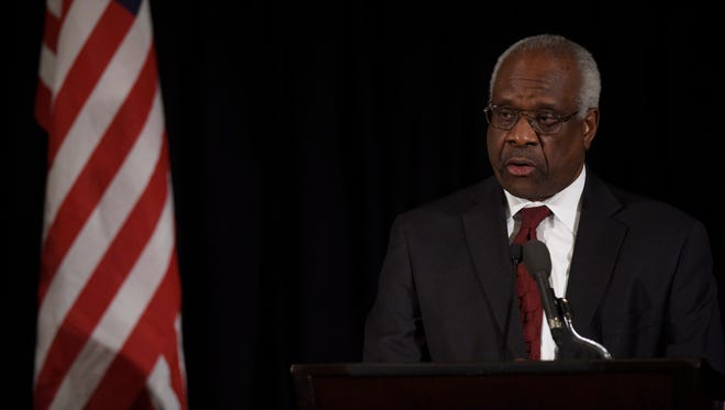 Supreme Court Justice Clarence Thomas speaks at the memorial service for Justice Antonin Scalia in Washington on March 1, 2016.