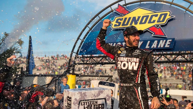 Martin Truex Jr. celebrates winning the 2016 Citizen Soldier 400 at Dover International Speedway, his fourth and final victory of the season.