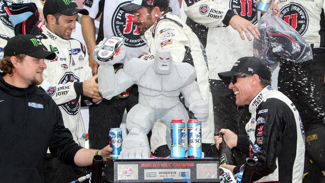 Kevin Harvick celebrates after winning the 2018 AAA Drive for Autism at Dover International Speedway.