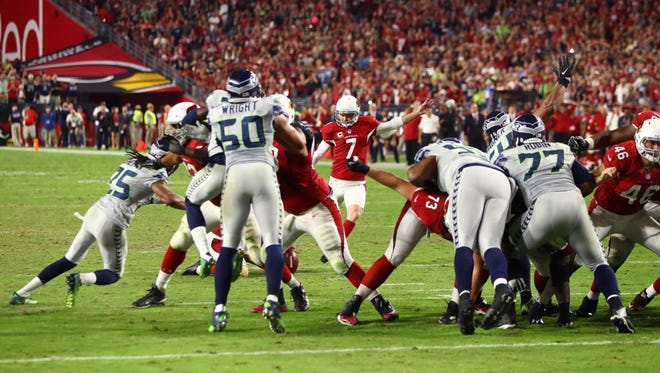 Cardinals kicker Chandler Catanzaro (7) misses a field goal in overtime against the Seahawks.