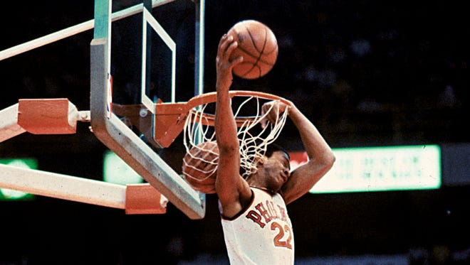 1984: Larry Nance of the Phoenix Suns dunks one ball after another during 1984 competition. Nance won the contest, which was the first in the NBA.