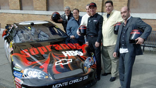 Clint Bowyer drove a Chevrolet sponsored by HBO's hit series "The Sopranos" for the 2006 race at Las Vegas Motor Speedway. Here Bowyer, third from right, poses with cast members (from left to right) Frank Vincent, Joe Gannascoli, Vincent Curatola, Bowyer, Steve Schirripa, and John Ventimiglia.