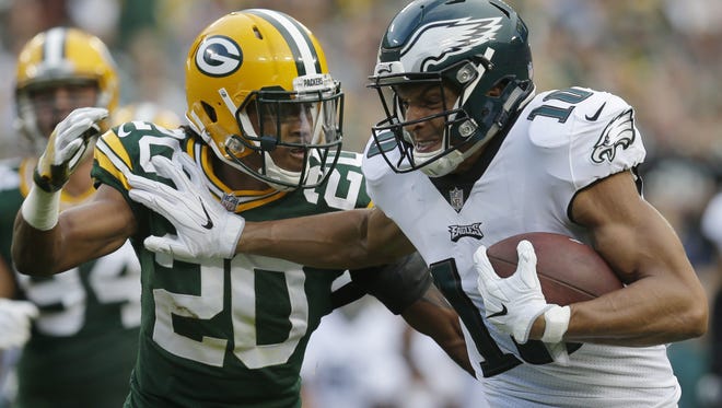 Philadelphia Eagles wide receiver Mack Hollins (10) evades  tackle by Green Bay Packers cornerback Kevin King (20) while enroute to a 30-yard touchdown reception during the second quarter of their game Thursday, August 10, 2017 at Lambeau Field in Green Bay, Wis.

MARK  HOFFMAN/MILWAUKEE JOURNAL SENTINEL