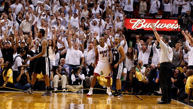 Ray Allen celebrates a game-tying three-pointer with 5.2 seconds left in the fourth quarter of Game 6 of the 2013 NBA Finals against the San Antonio Spurs.