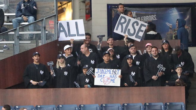 May 22: Fans seated in the right field fan section named "The Judges Chambers" for Aaron Judge.
