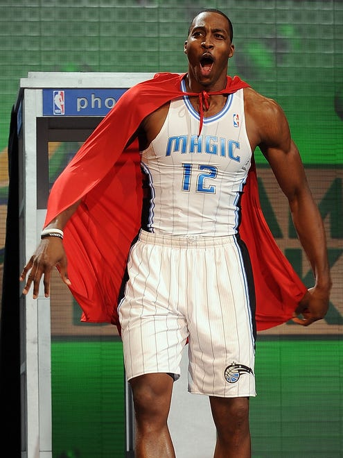 2009: Dwight Howard emerges from a phone booth with a Superman cape on. Despite his theatrics, he would lose to Nate Robinson.
