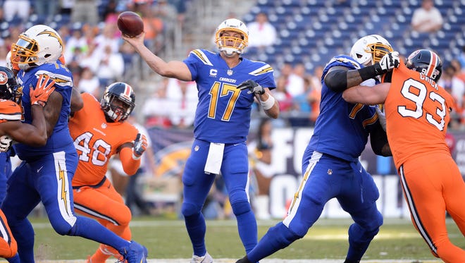 San Diego Chargers quarterback Philip Rivers (17) throws a pass during the first quarter of the game against the Denver Broncos at Qualcomm Stadium.