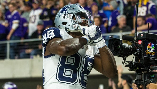Dallas Cowboys wide receiver Dez Bryant (88) celebrates his touchdown during the fourth quarter against the Minnesota Vikings at U.S. Bank Stadium.