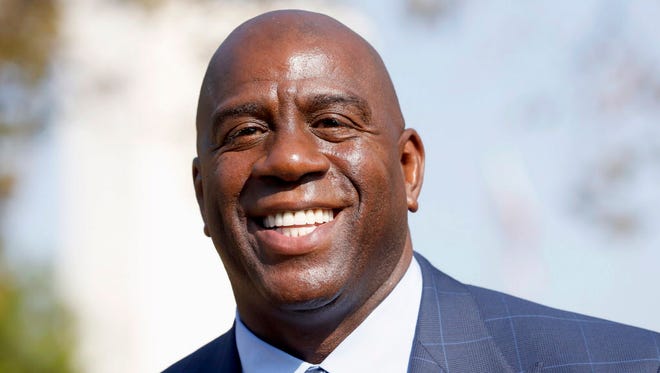 Former Lakers star Magic Johnson says he wants to become the team's shot caller.