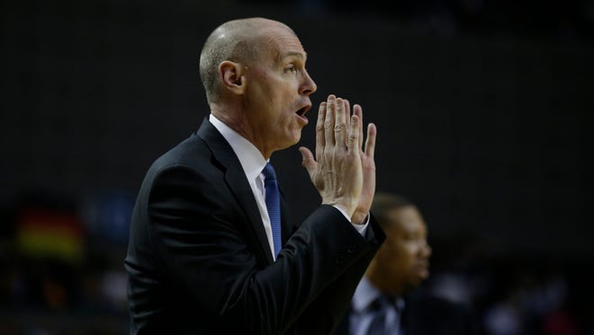 Dallas Mavericks head coach Rick Carlisle communicates from the sideline during the first half of a regular-season NBA basketball game against the Phoenix Suns in Mexico City, Thursday, Jan. 12, 2017.