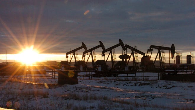 Oil pump jacks are seen McKenzie County, in western North Dakota.
