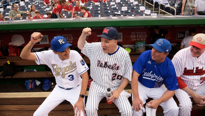 Rep. Trent Kelly, R-Miss., cheers with teammates during the annual congressional baseball game at Nationals Park on June 23, 2016.