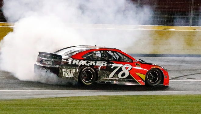 Martin Truex Jr. does a victory burnout after leading 392 of 400 laps -- and 588 miles -- in winning the 2016 Coca-Cola 600. Truex broke Jim Paschal’s 1967 record for the most laps led in the 600 (335).