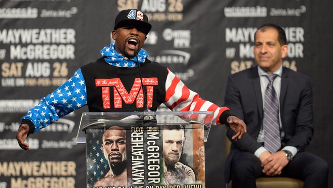 Floyd Mayweather speaks during a world tour press conference to promote the upcoming Mayweather vs McGregor boxing match.