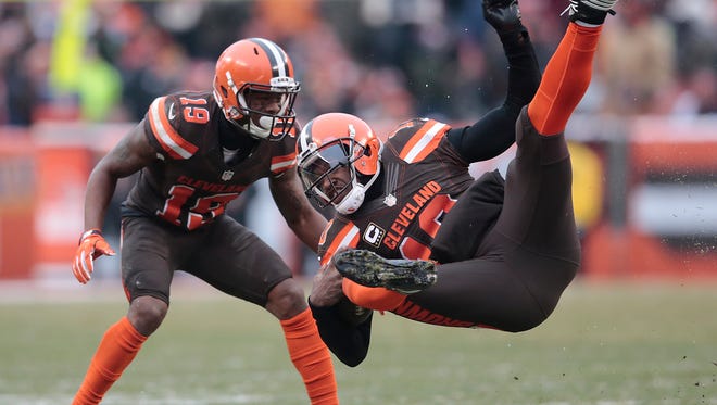 Cleveland Browns quarterback Robert Griffin III (10) is tackled in the fourth quarter during the Week 14 NFL game between the Cincinnati Bengals and the Cleveland Browns, Sunday, Dec. 11, 2016, at FirstEnergy Stadium in Cleveland. Cincinnati won 23-10.