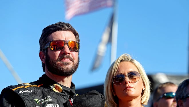 Martin Truex Jr. (78) and girlfriend Sherry Pollex before the Ford EcoBoost 400 at Homestead-Miami Speedway.