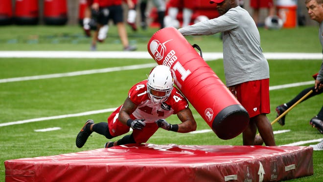Jul 22, 2017; Glendale, AZ, USA; Arizona Cardinals safety Antoine Bethea (41) participates in a drill during the opening day of training camp at University of Phoenix Stadium.  Mandatory Credit: Rob Schumacher/azcentral sports via USA TODAY NETWORK ORIG FILE ID:  20170722_gma_usa_079.jpg