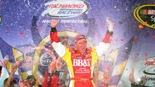 Clint Bowyer celebrates after winning the Dan Lowry 400 Sprint Cup race at Richmond International Raceway on May 3, 2008.