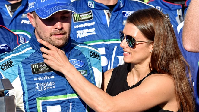 Danica Patrick helps Ricky Stenhouse Jr. celebrate in victory lane at Talladega Superspeedway on May 7.