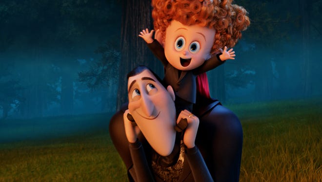 Dracula (voiced by Adam Sandler) gets to know his grandson Dennis (Asher Blinkoff) in "Hotel Transylvania 2."
