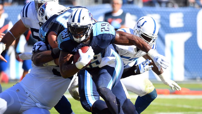 Tennessee Titans running back DeMarco Murray (29) runs for a short gain in the red zone during the first half against the Indianapolis Colts at Nissan Stadium.